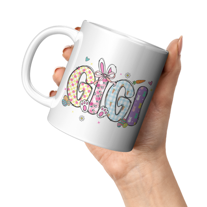 Gigi_Easter_Mug_11oz_White_LH_Model_Mockup.png_15438680